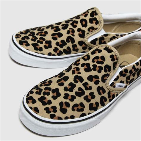 leopard print slip on vans.